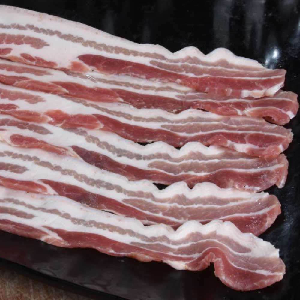 Dry Cured Unsmoked Streaky – Using the Gloucester old spot pigs cured on Heron’s Farm, Essex.