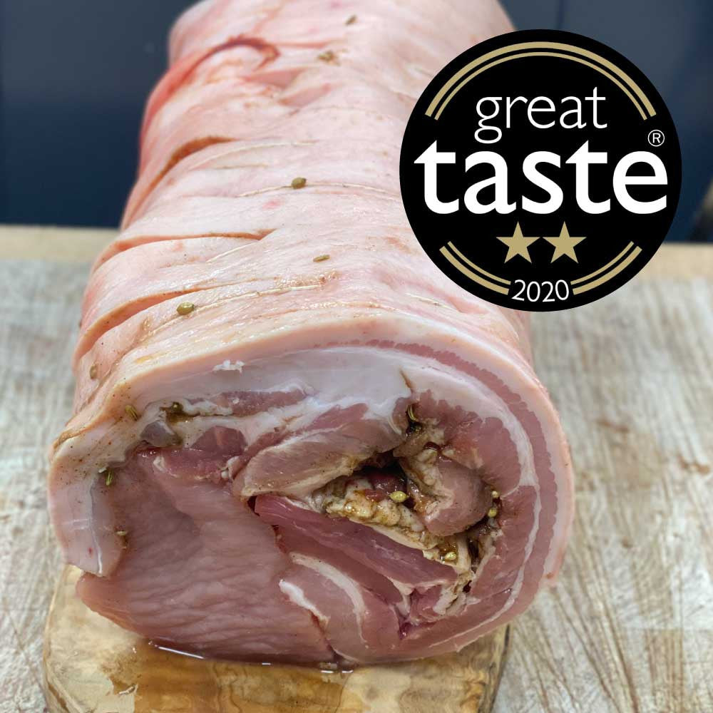 Our 2 Star Great Taste Award! We roll the belly and
the loin which is marinated with our Tuscan Seasoning, the fat form the belly keeps the loin beautifully tender