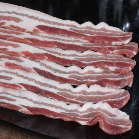 Dry Cured  Unsmoked Streaky – Using the Gloucester old spot pigs cured on Heron’s Farm, Essex.